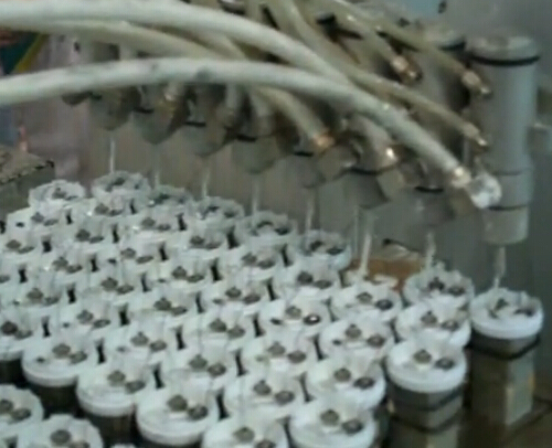 节能灯驱动电源灌胶工作原理